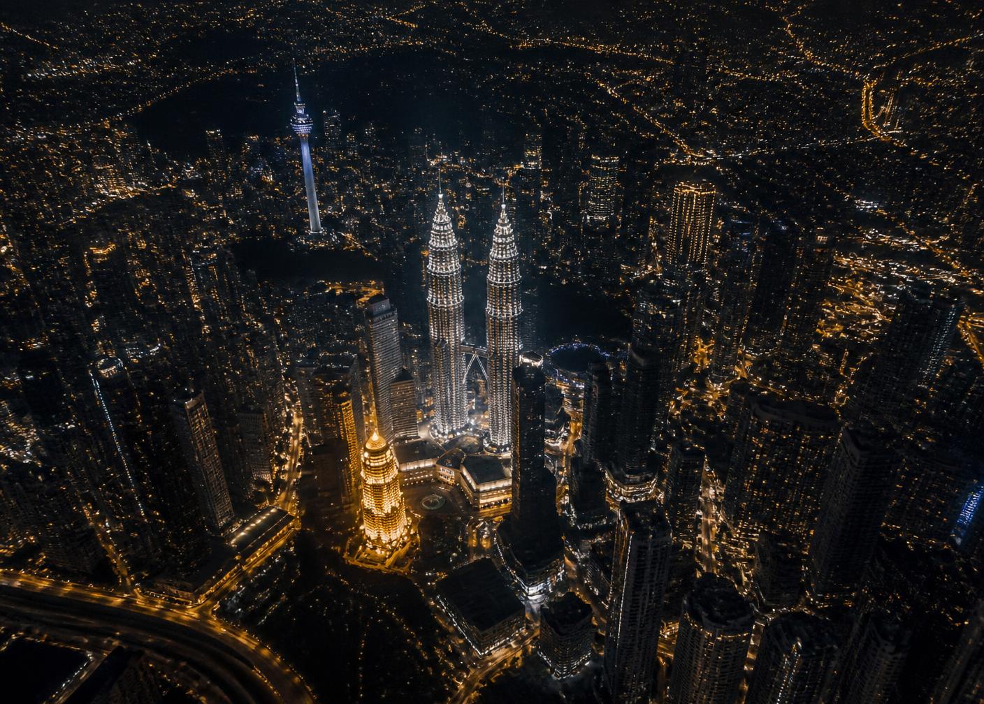 Aerial night view of Kuala Lumpur City Centre showing the CloutHaus neighbourhood