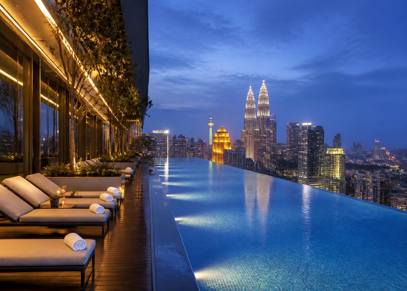 Resort-style sky pool overlooking the Kuala Lumpur skyline at blue hour